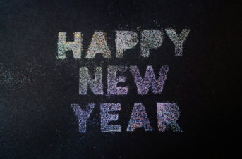 a-happy-new-year-written-on-a-black-background.jpg a happy new year written on a black background