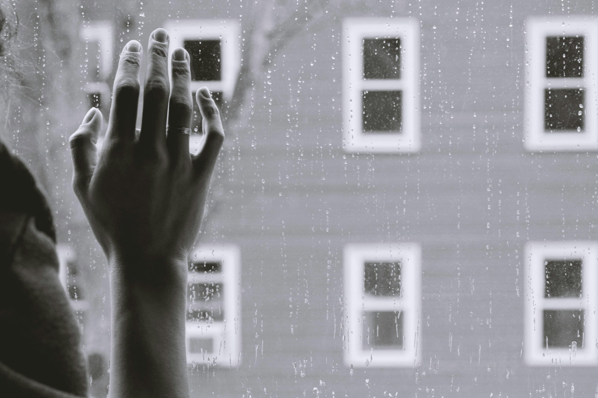 grayscale-photo-of-woman-right-hand-on-glass.jpg grayscale photo of woman right hand on glass